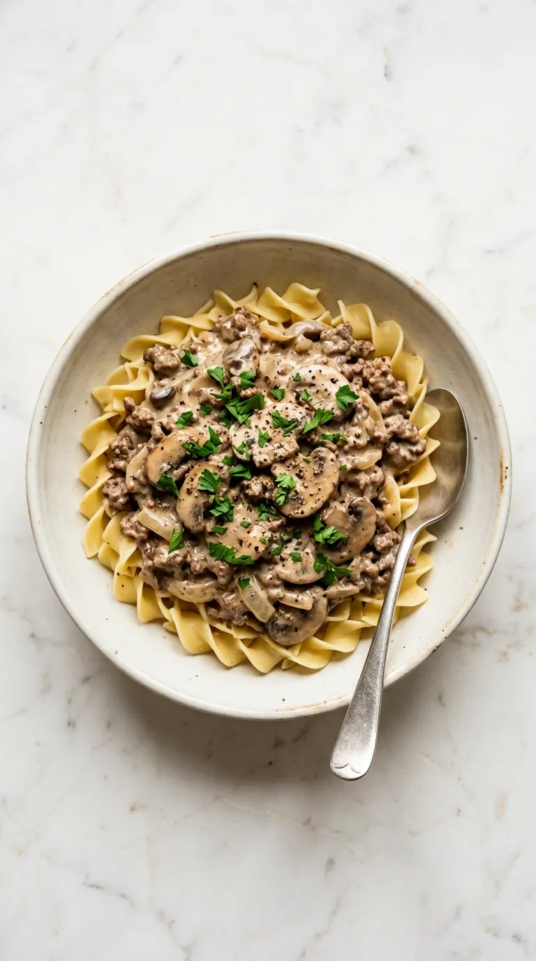 Creamy Ground Beef Stroganoff over Egg Noodles served